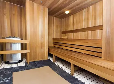 a sauna with wooden benches in a room at The Vancouver Penthouse, 2-Level, Patios, Hot Tub in Vancouver