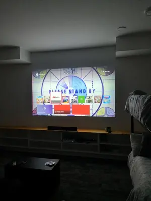 a large flat screen tv in a living room at Après-Ski Lodge in Agassiz