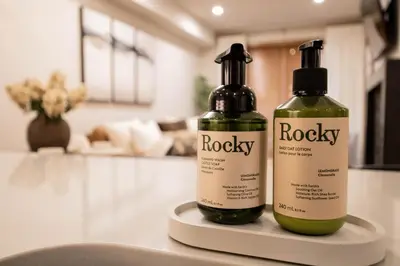 two bottles of rocky on a counter in a kitchen at Luxury Spring Creek Condo with Hot Tub in Canmore