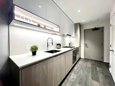 a kitchen with a sink and a counter top at Cozy and convenient 1B1B near Richmond center in Richmond
