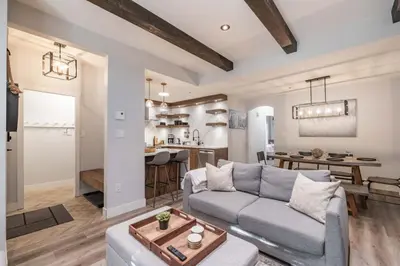 a living room with a couch and a table at Symphony 8 by Outpost Whistler in Whistler