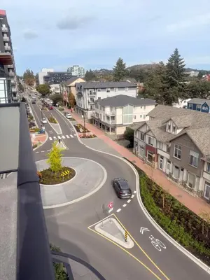 a car driving down a road in a city at Mollies Alpha in Langford