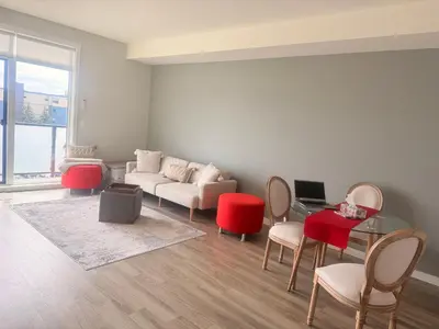 a living room with a couch and chairs at Mollies Alpha in Langford