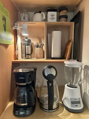 a coffee maker and a blender on a counter at Studio Cedar Guest Cottage in Duncan