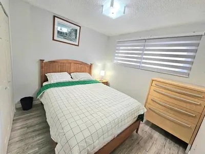 a bedroom with a bed and a window at Kirvia's retreat 