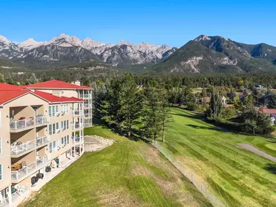 an aerial view of a resort with mountains in the background at The Pinnacle in Fairmont 1BR Condo Near Hot Springs in Fairmont Hot Springs