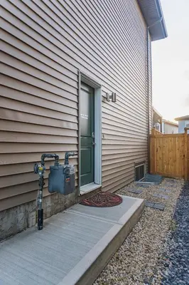 a front door of a house with a door istg istg at Superior and Spacious 2-bedroom basement private suite in Edmonton