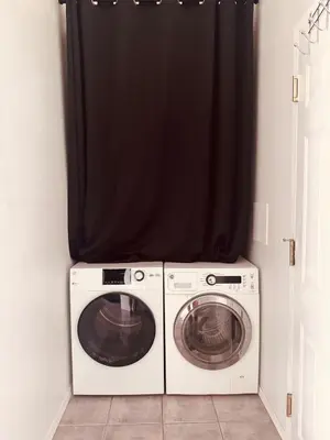 a washing machine and a washer in a room at Stunning Mountain View in Fairmont Hot Springs