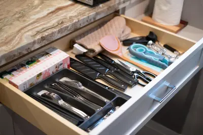 a drawer filled with utensils and other kitchen items at Brand New Stylish 2 bedrooms Suite in Shaughnessy in Vancouver