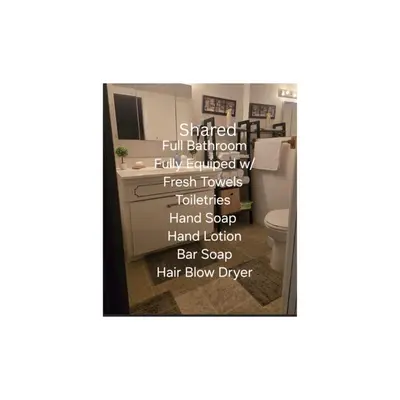 a picture of a bathroom with a sink and a toilet at Self Check-In Keyless Private Entry DBL Queen Suite in Mission City