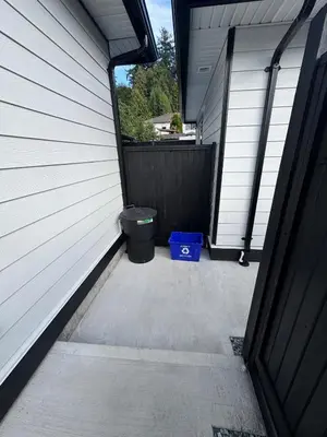a garage with a toilet sitting next to a door at Brand new fully Private Garden suite 2 in Delta