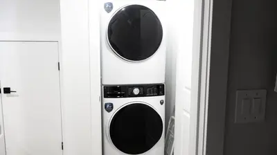two microwaves stacked on top of each other at A true Home away from Home in Calgary