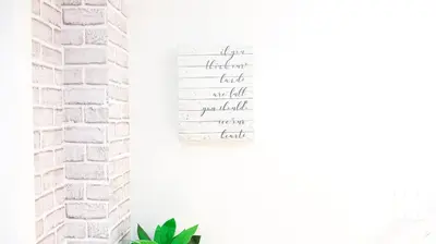 a white brick wall with a note on it at A true Home away from Home in Calgary