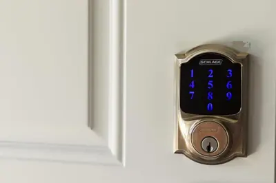 an alarm clock is attached to a door at 5BDRM Bright Modern Home-King Bed-Garage-Sleeps 12 in Edmonton