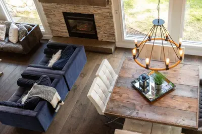 an overhead view of a living room with a fireplace at True North Chalet by Fernie Central Reservations in Fernie