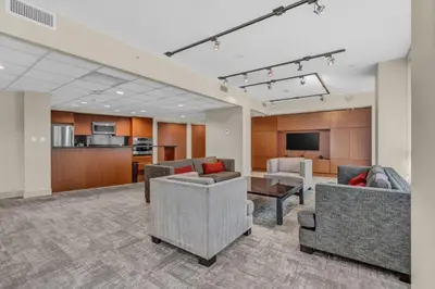 a living room with two couches and a tv at Corporate Stays Capitol Residences 1 Bedroom in Vancouver