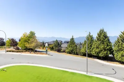 an empty street with a street light in the middle at Tranquil 2-Bedroom Basement Suite Relaxing Stay in Chilliwack