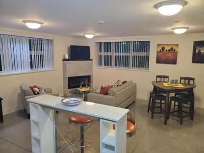 a living room with a couch and a table at Forest Hills in North Vancouver