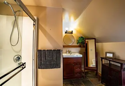 a bathroom with a sink and a shower at Timberloft by Revelstoke Vacations in Revelstoke