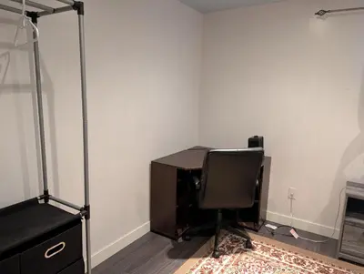 an office with a desk and a chair in a room at 2-Room Suite in South Edmonton in Edmonton
