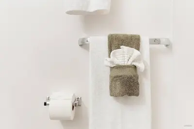a bathroom with towels hanging on a wall at Lynn Valley 2BR Suite By Grouse Mtn & Lynn Canyon in North Vancouver