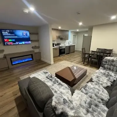 Peaceful 2BR Getaway with Fireplace & Parking Basement Suite