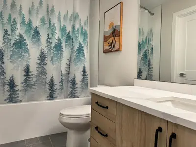 a bathroom with a toilet and a sink at Paradise Point - Hot Tub & Mountain Views in Golden
