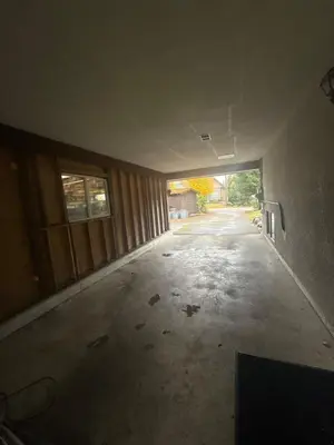 an empty room with an empty hallway with a window at The Sunshine Haven in Delta