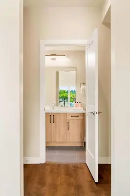 a bathroom with a sink and a mirror at Stylish 2BR Golden Getaway with BBQ and Stunning Views in Golden