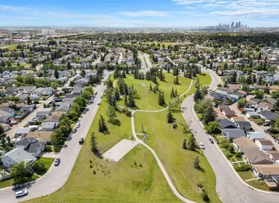an aerial view of a residential neighborhood with houses at The Arizona 2BR Pet-Friendly Suite Calgary SE in Calgary