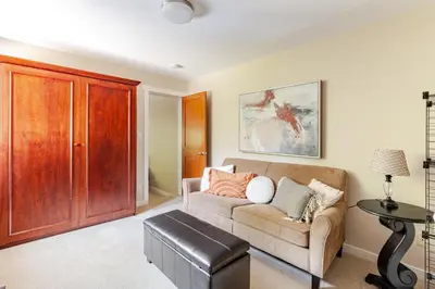 a living room with a couch and a table at Crystal Ridge by Whistler Retreats in Whistler