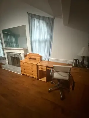 a office with a desk and a chair and a dresser at EXTRA Large Suite with Ensuite Bathroom, Microwave & Fridge in Richmond