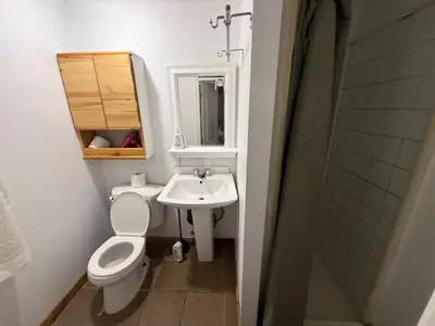 a bathroom with a toilet and a sink at EXTRA Large Suite with Ensuite Bathroom, Microwave & Fridge in Richmond