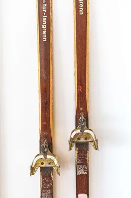 a pair of skis hanging on a wall at Valhalla - Pure Mountain Bliss in Canmore