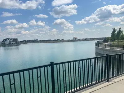 a view of a river from a bridge at Deluxe Mahogany Lake Getaway Sleeps 4 in Calgary
