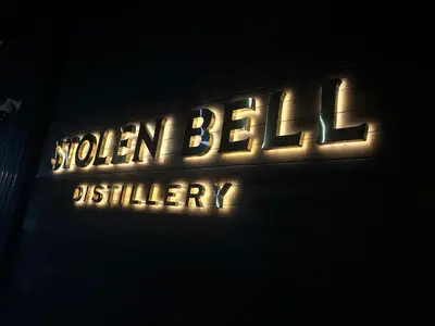 a neon sign that says modern beelley on a building at Oso Skyview Suite - DT modern 2 bed, 2 bath in Golden