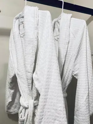 a group of white shirts hanging on a clothesline at 5 Minutes away from Edmonds Station! Ideal location for all events & attractions in New Westminster
