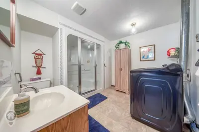 a bathroom with a sink and a shower at Pet-Friendly Original Ski Cabin by StayIn in Panorama