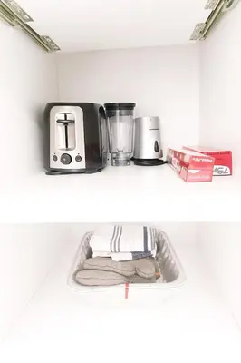 a shelf with a toaster and a toaster at Cozy Suite near West Edmonton Mall & River Cree Casino in Edmonton