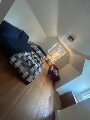 an overhead view of a bedroom with a bed at Vancouver Home - Airport 10 Min, Downtown 15 Min - Free Parking & Fast Wi-Fi in Vancouver