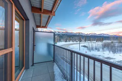 a balcony with a view of the snow covered mountains at Modern 2BR in Golden w/ Stunning MTN Views! in Golden