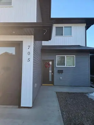 a house with a front door with the number at ideal place in Prince George