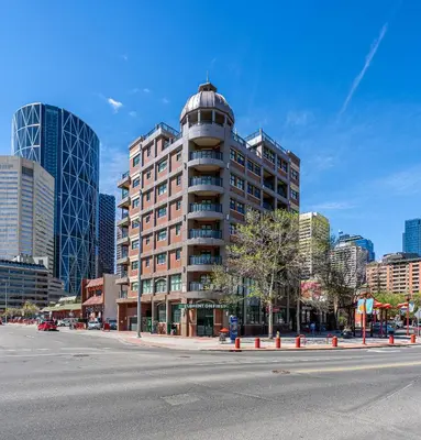 a tall building with a dome on top of it at Delightful 2 BR And 2 Bath Water View in Downtown in Calgary