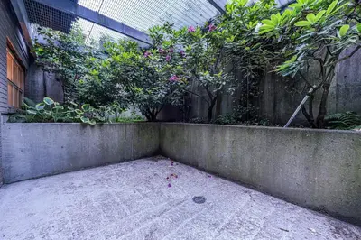 a garden with flowers and plants in a building at Luxury 1200 squft 2BR Shaughnessy Suite Near YVR & DT in Vancouver