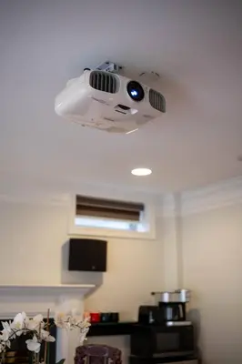 a ceiling with a camera on top of a room at Comfort Spacious 2-BR Suite in Arbutus in Vancouver