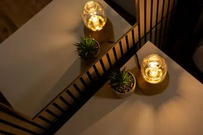 a table with potted plants and lights on it at Quiet Yellow Unit- Stampede, BMO, Nightlife Etc. in Calgary