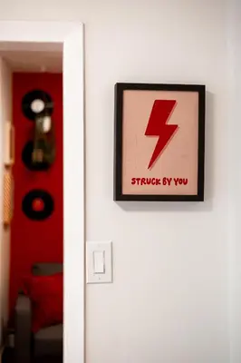 a door with a sign that reads strike by you at Retro-Chic Hideaway - Walking Distance To Stampede in Calgary