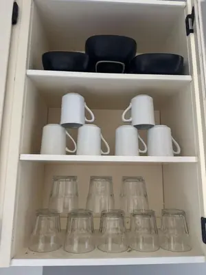 a drawer filled with dishes and glass items at Fully furnished House near GrayNuns, Millwoods in Edmonton