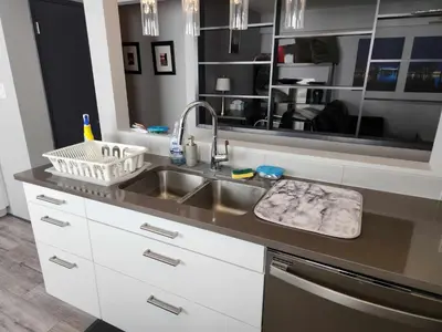 a kitchen counter with a sink and a sink at Vancouver house 3 bedrooms and balcony Perfect for your business trip to Vancouver in Vancouver
