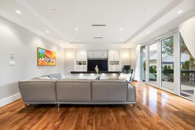 a living room with a couch in the middle at An Amazing StarHouse in Westside Vancouver in Vancouver